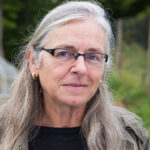Dr. E. Melanie Dupuis